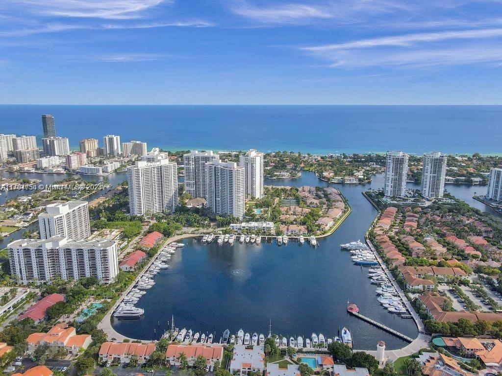 a view of a city with tall buildings