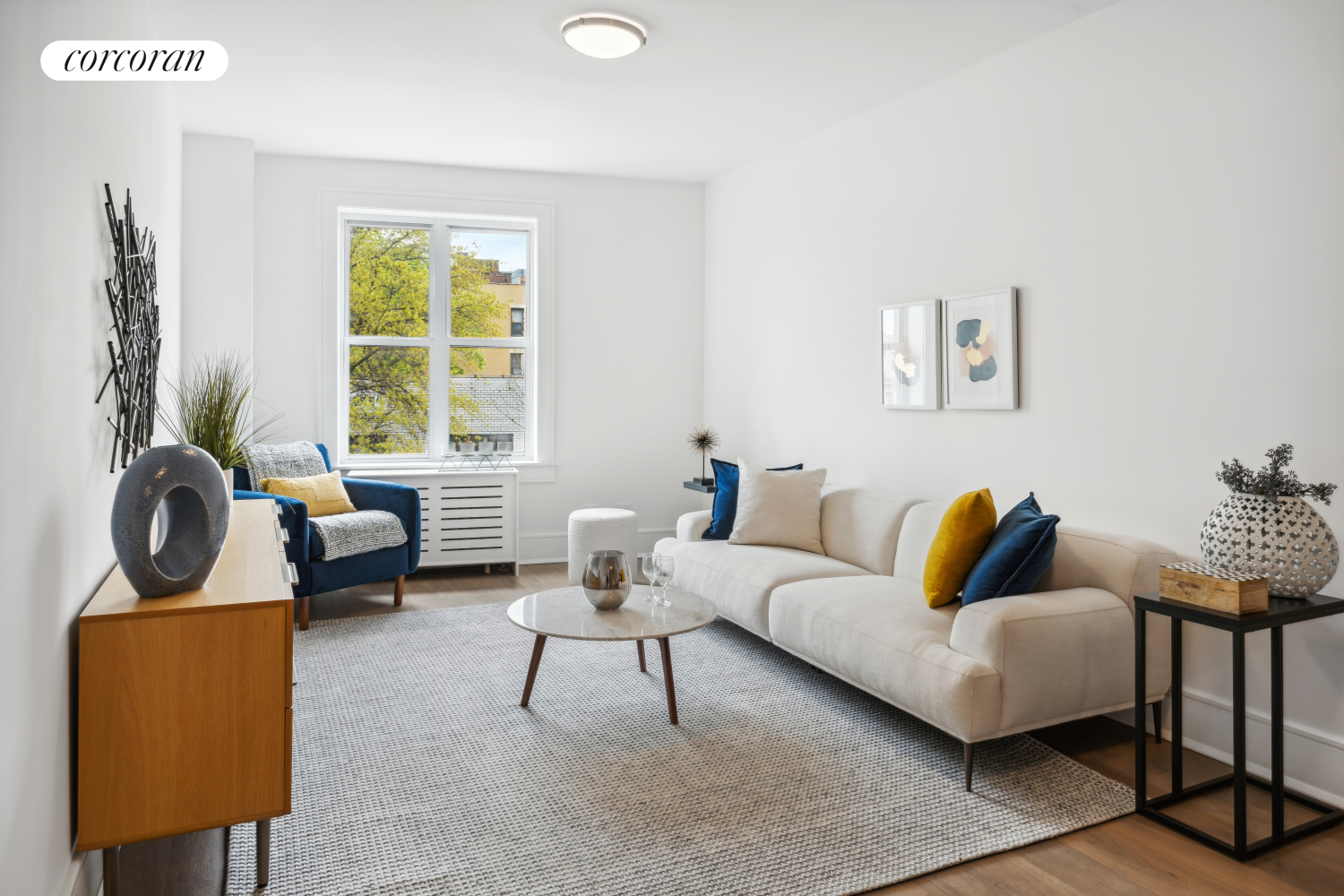 a living room with furniture and a window