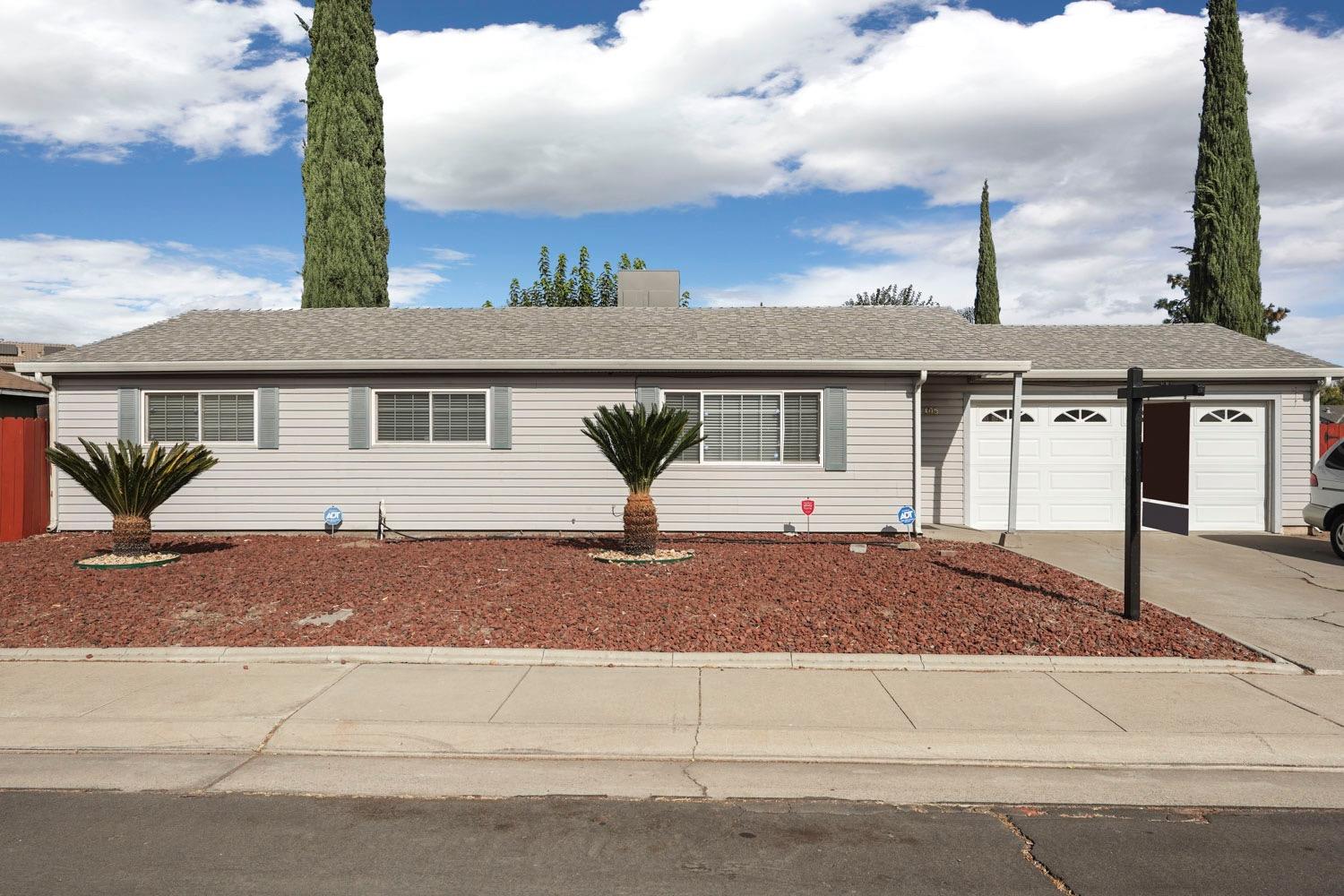 front view of a house with a street