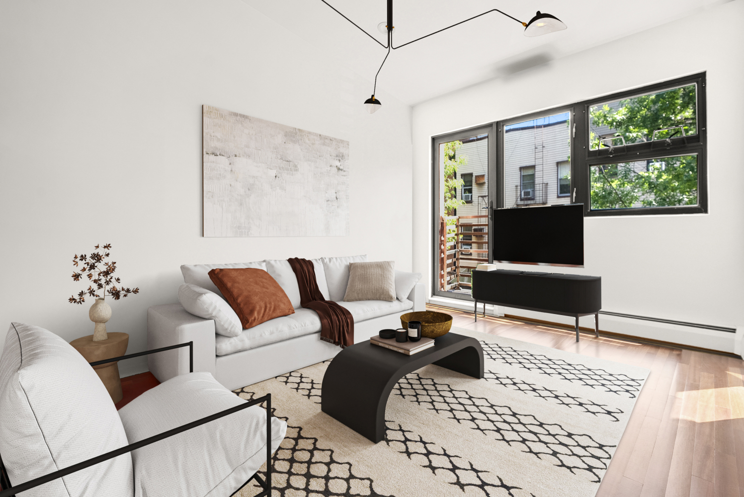 a bedroom with furniture and a window