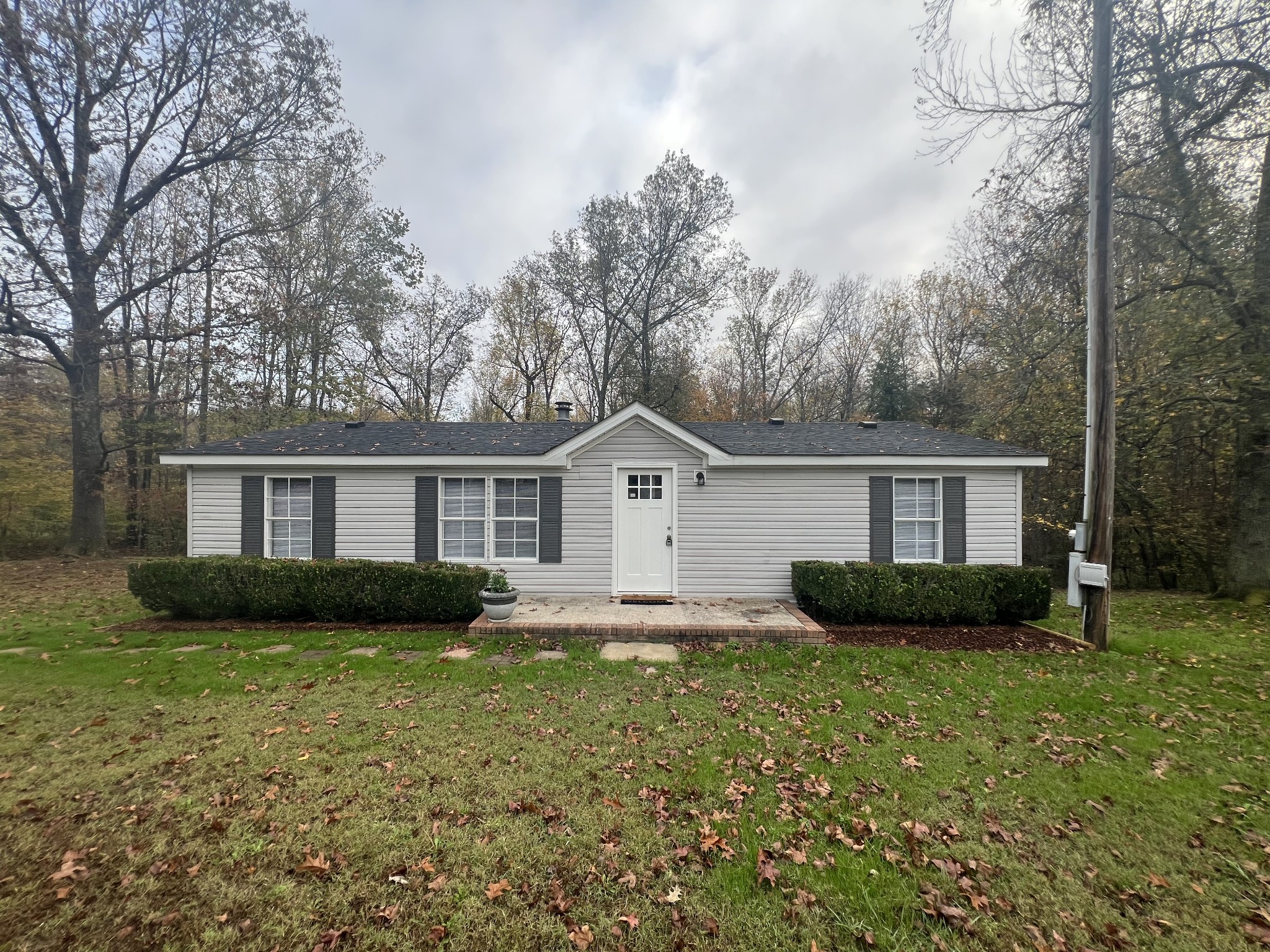 front view of a house with a yard