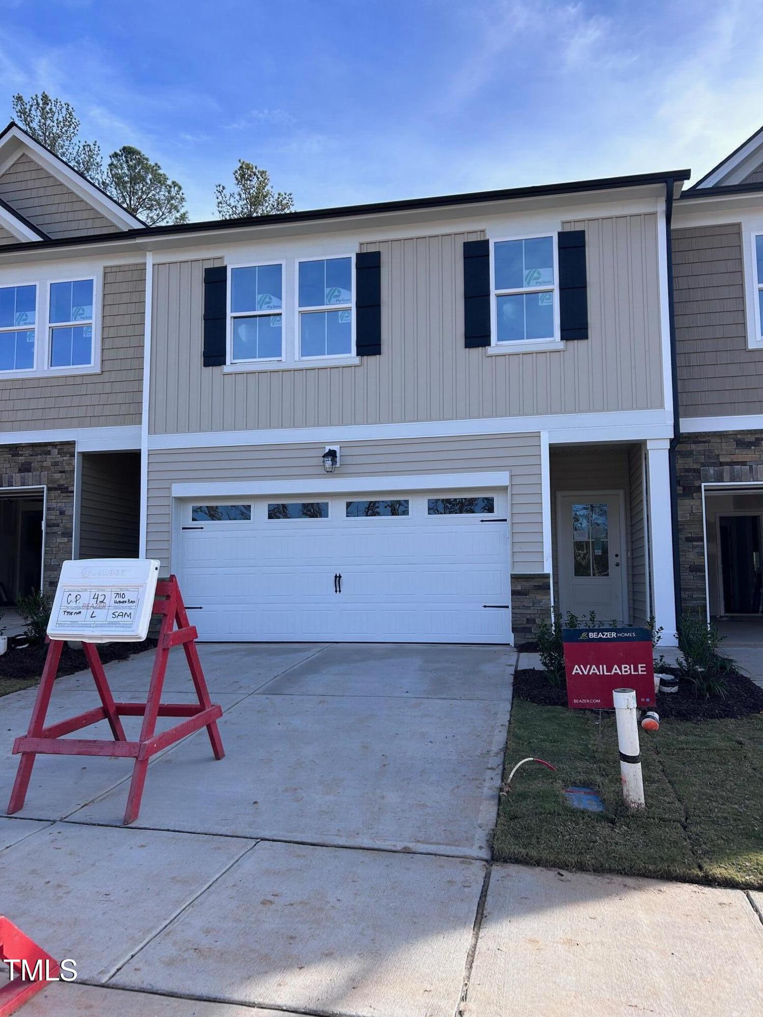 a front view of house with yard