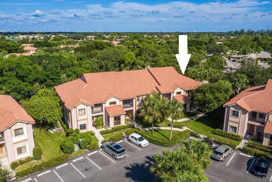 an aerial view of a house with a garden