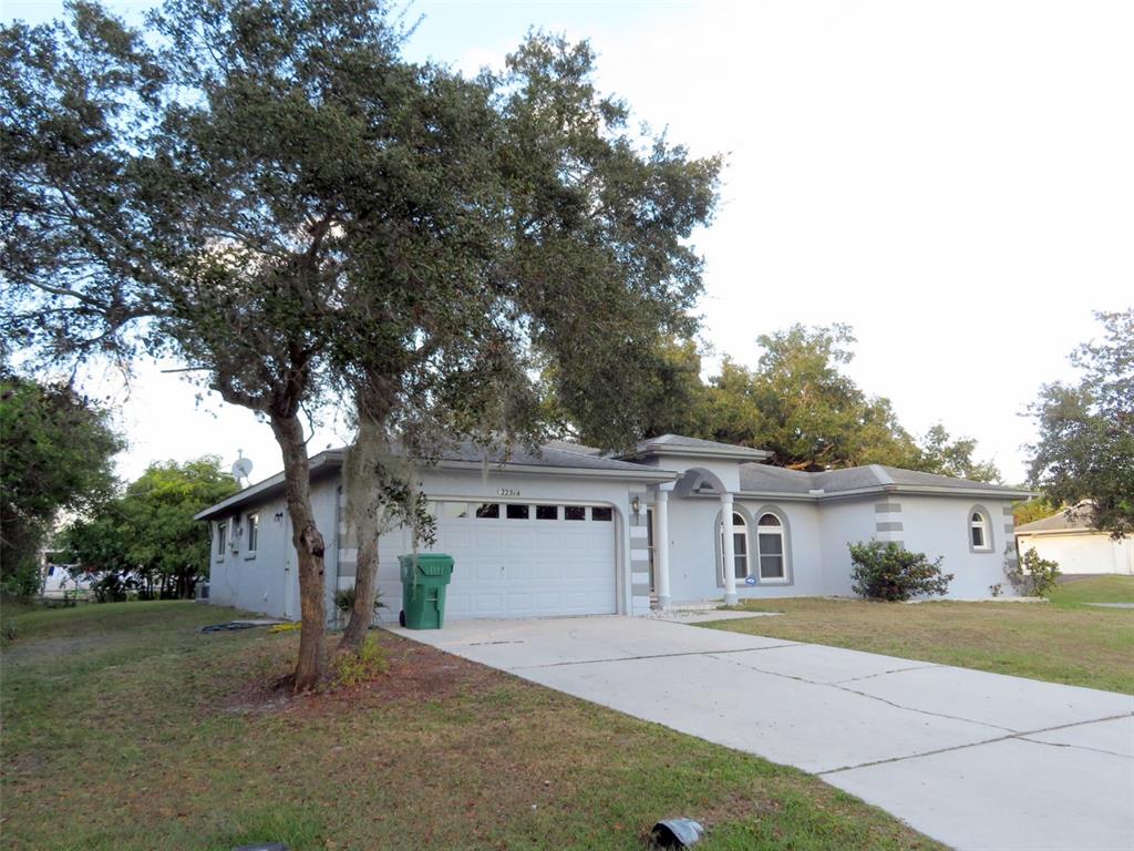 front view of a house with a yard