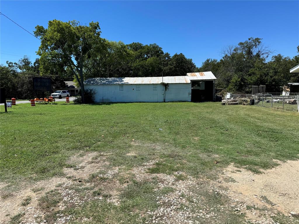 a view of outdoor space and yard