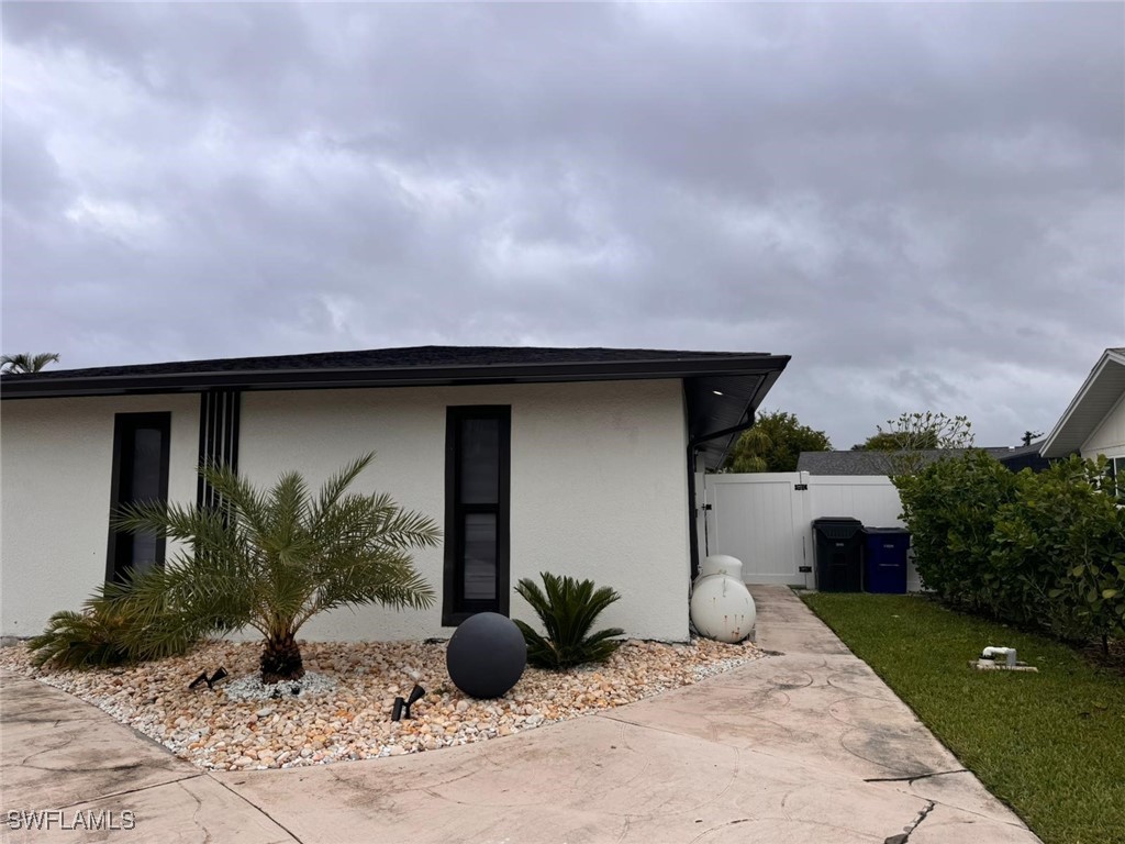 a house view with a garden space