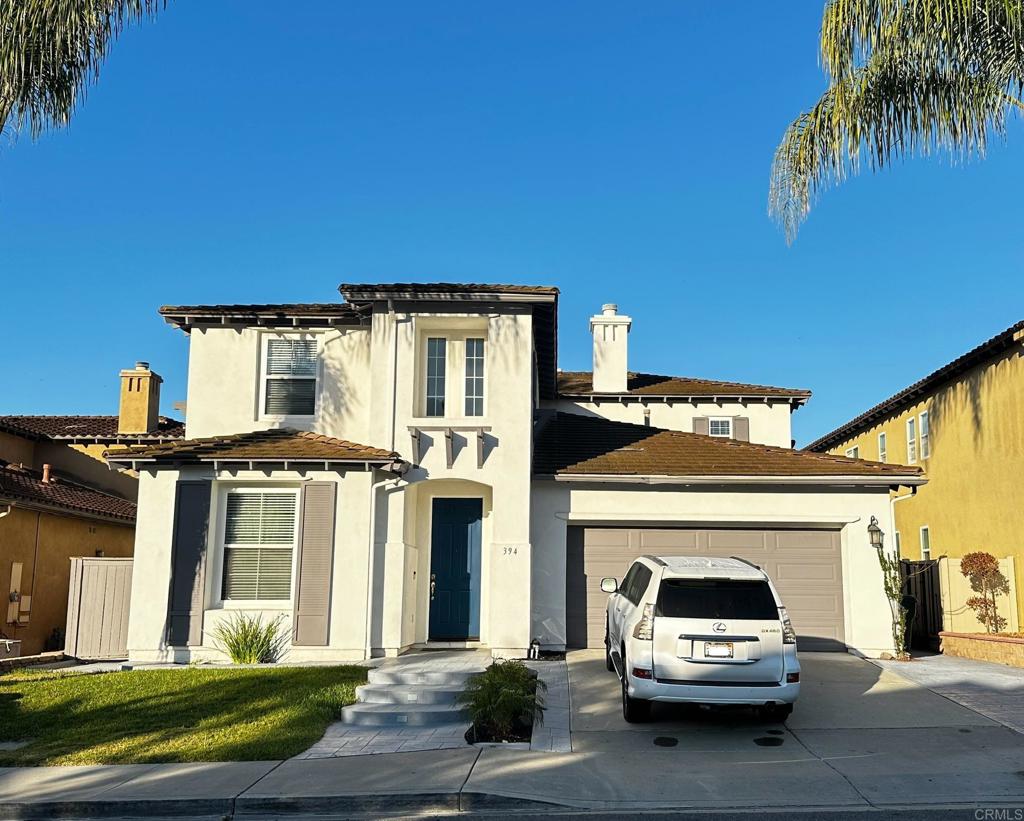 a car parked in front of a house