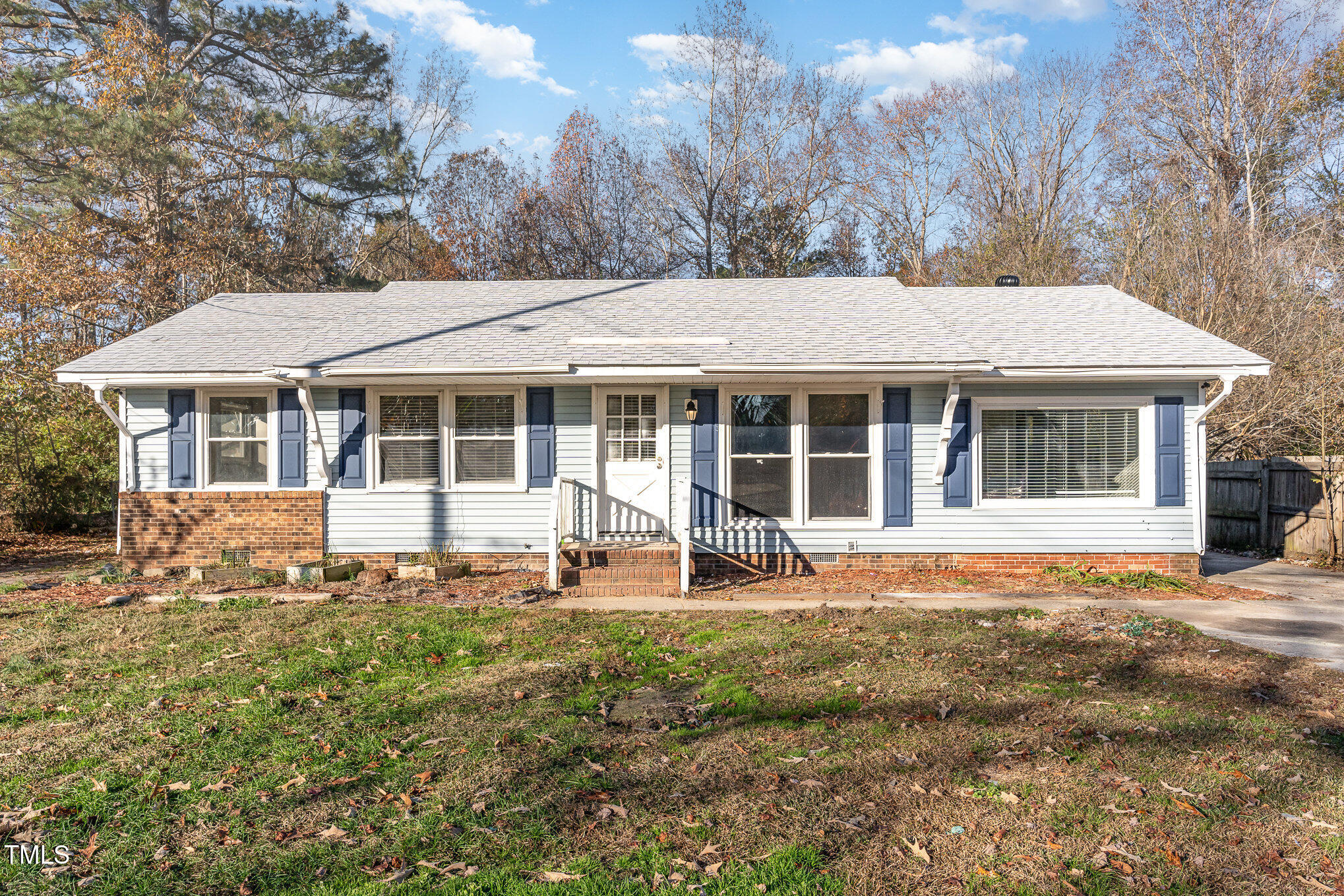 front view of a house with a yard