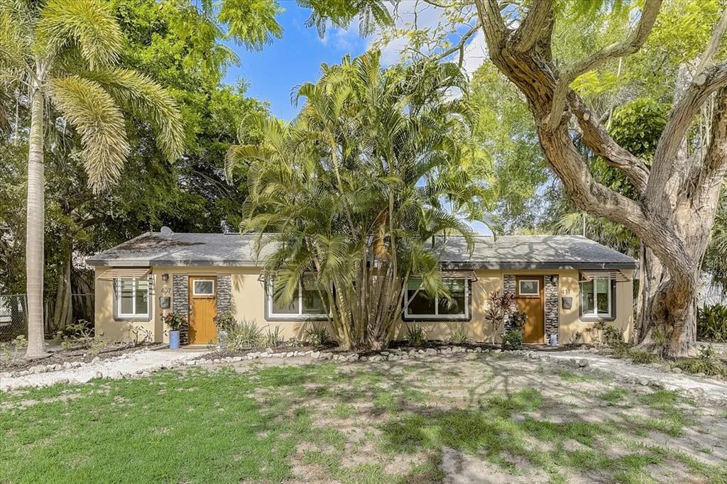 front view of a house with a big yard