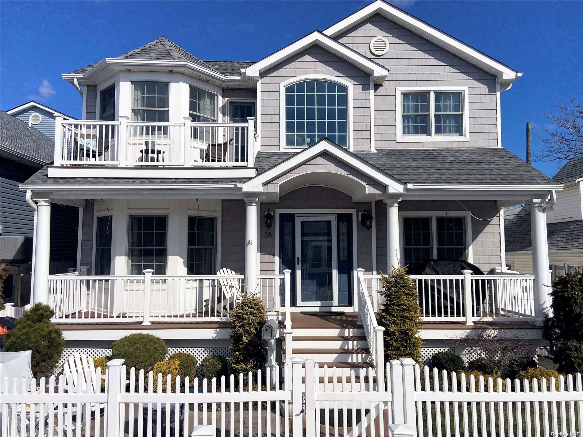 front view of a house with a small yard