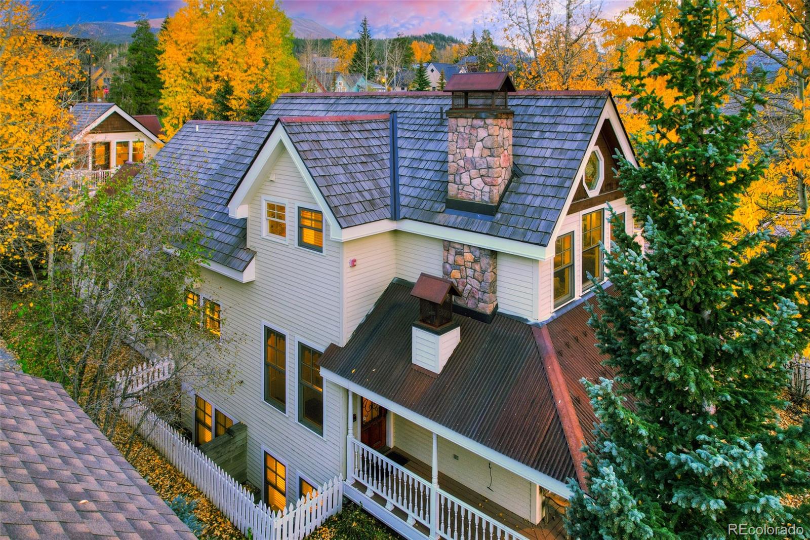 front view of a house with a small yard