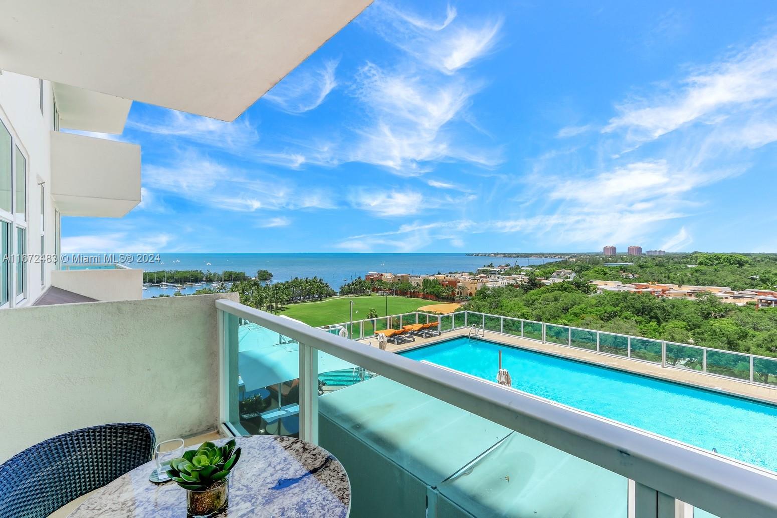 a view of a balcony with an ocean view