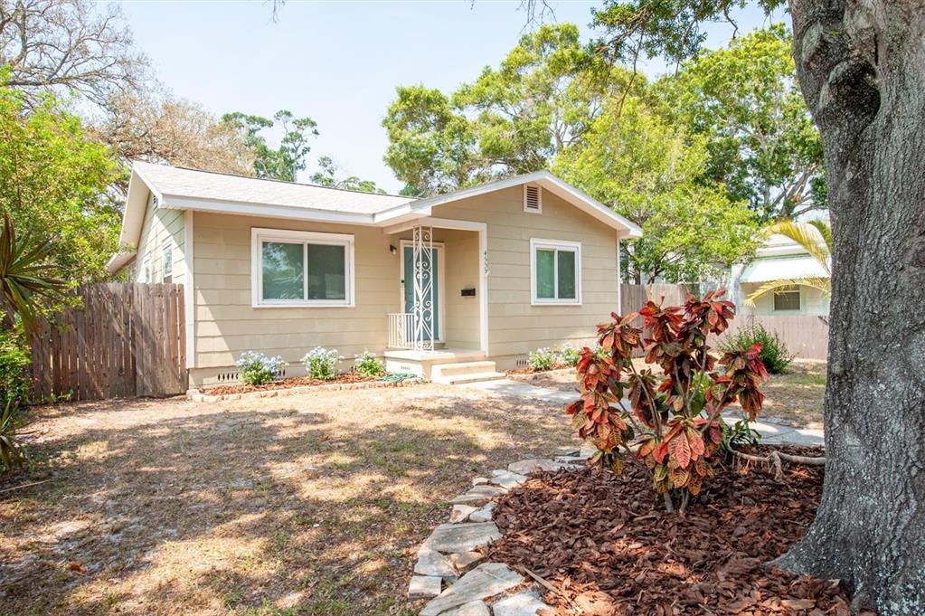 front view of a house with a yard