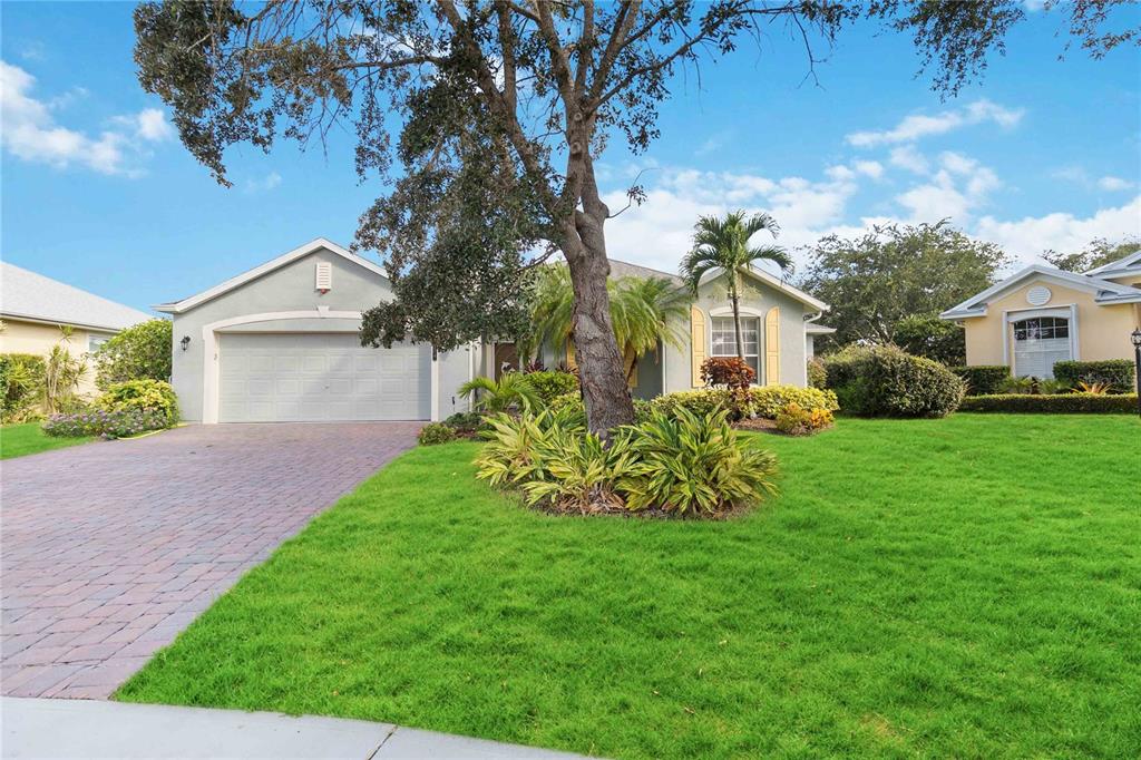 a view of a house with a back yard