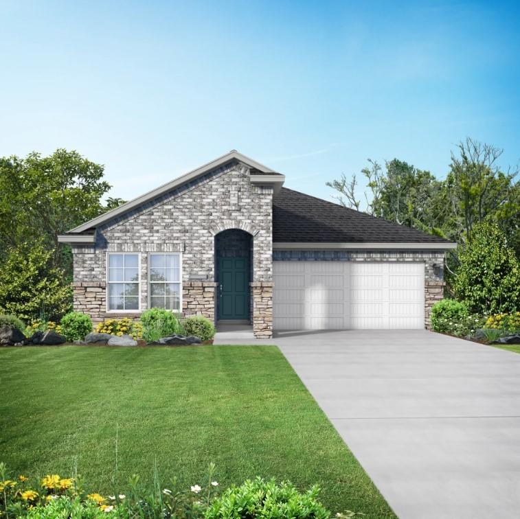 a front view of house with yard and green space