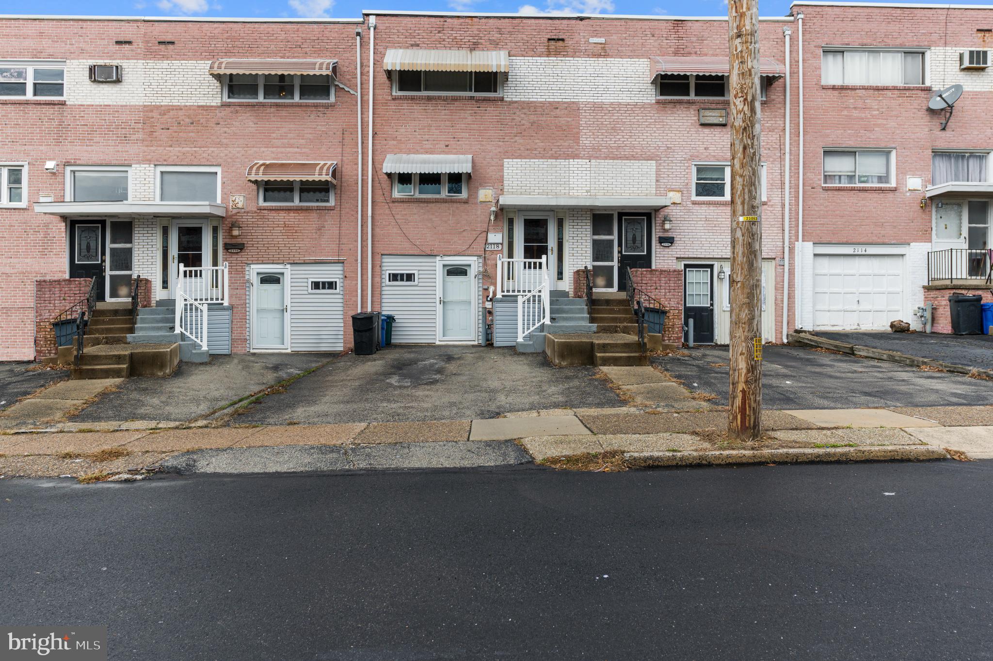 a front view of a building with street