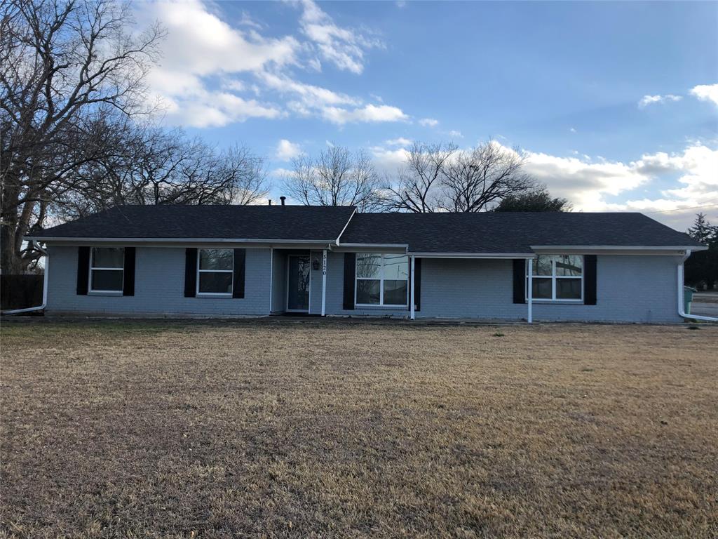 front view of house with a yard