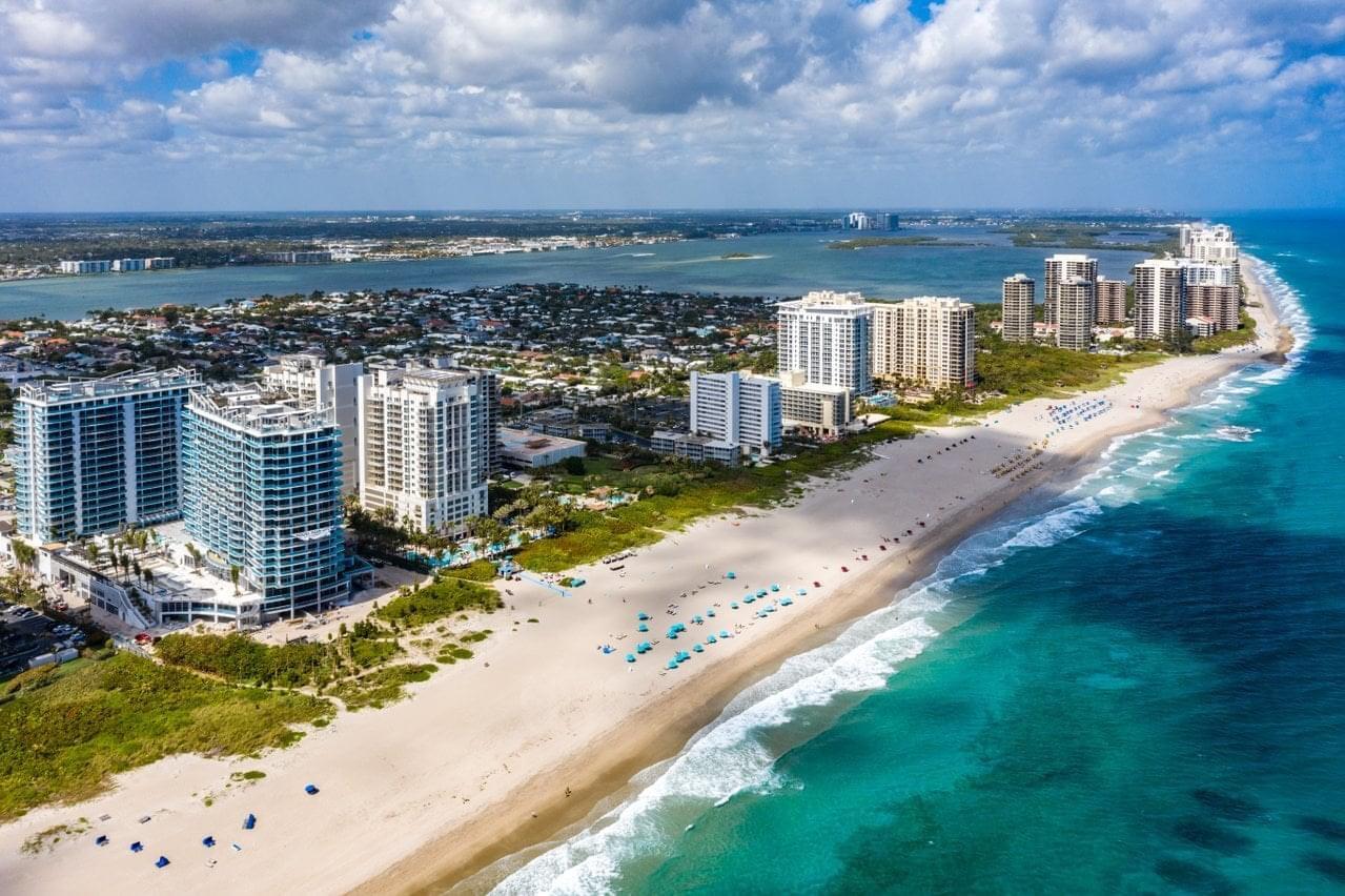 a view of a city with an ocean view