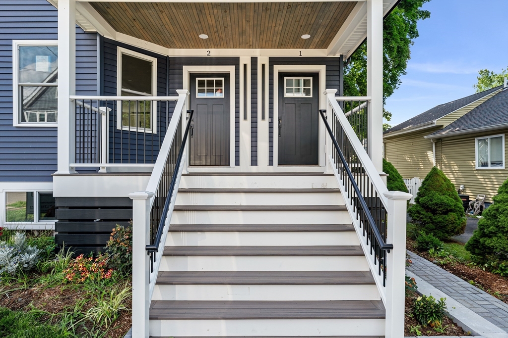 a view of entryway with a front door