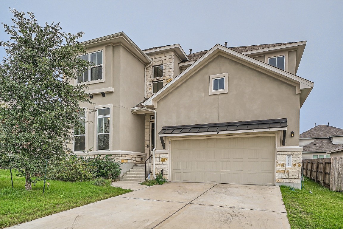 a house view with a outdoor space