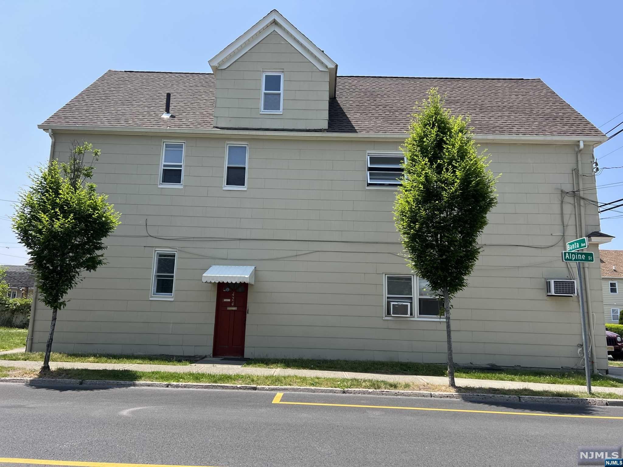 a front view of a house with a garage