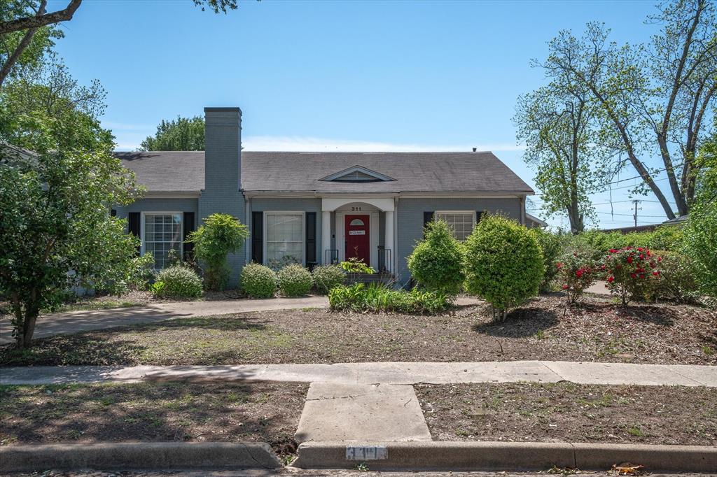 a front view of house with yard