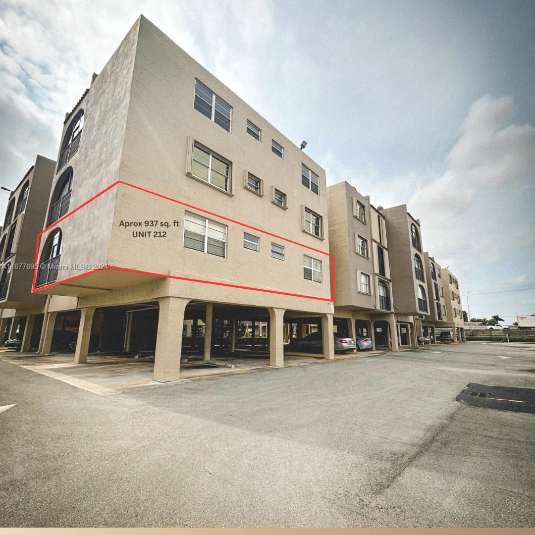 a front view of a building with a street