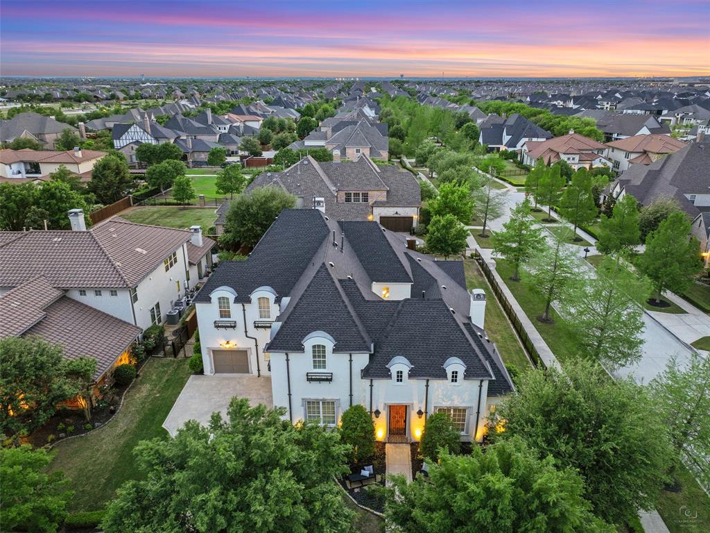 an aerial view of a house with a garden