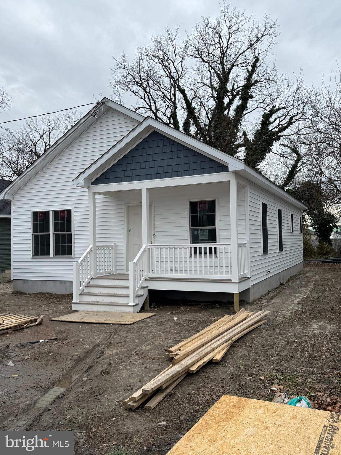 a front view of a house with a garage