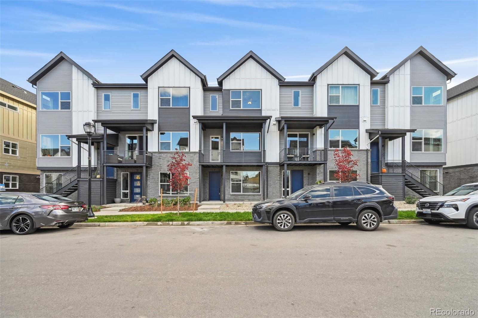 a car parked in front of a house