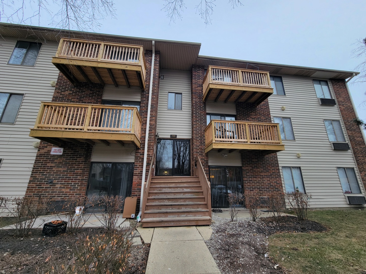 front view of a house with a balcony