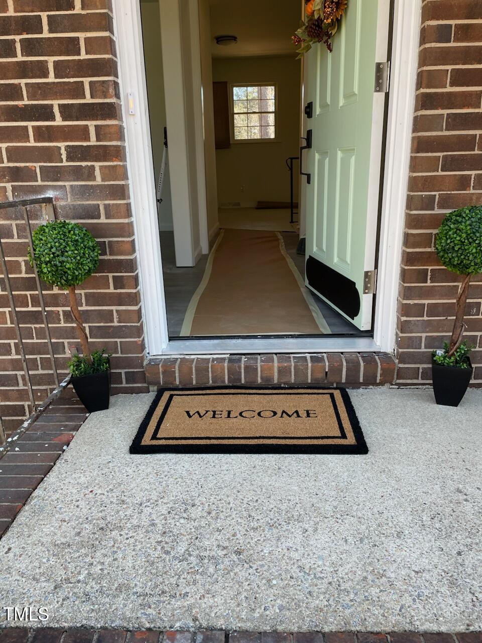 a view of a entryway door of the house