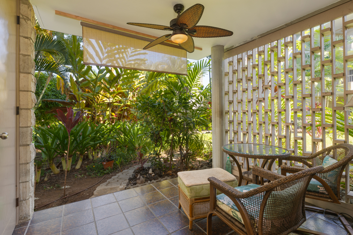 a outdoor living space with furniture and garden view