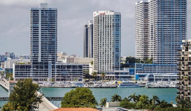 a view of a city with tall buildings