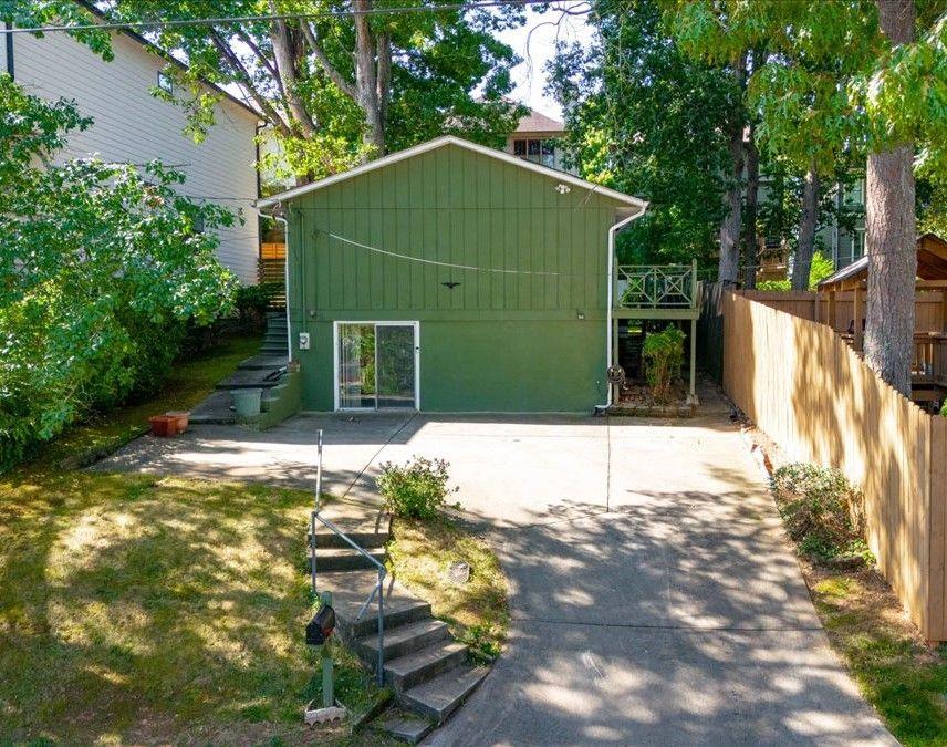 a house with trees in front of it