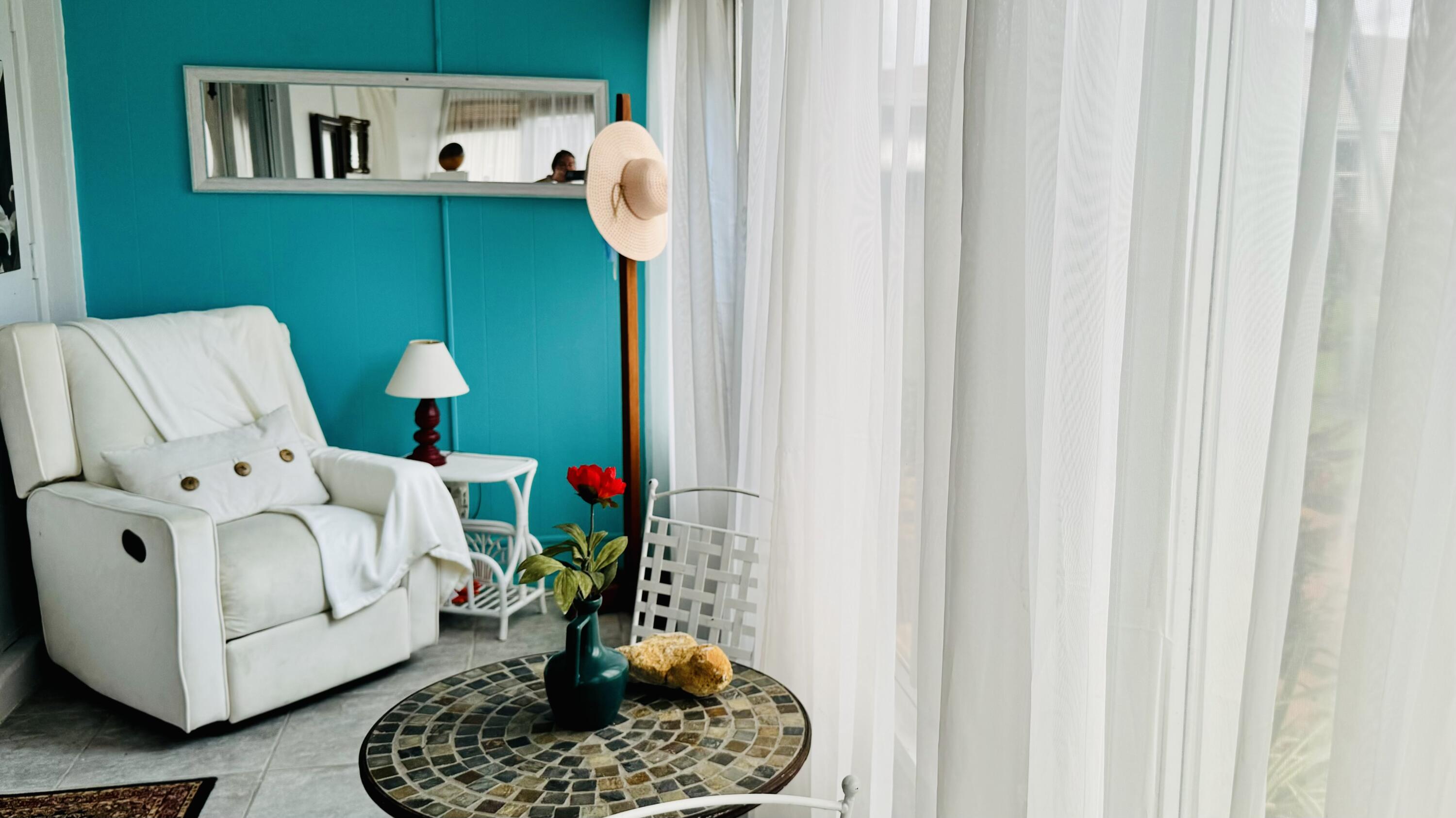 a living room with furniture and a table