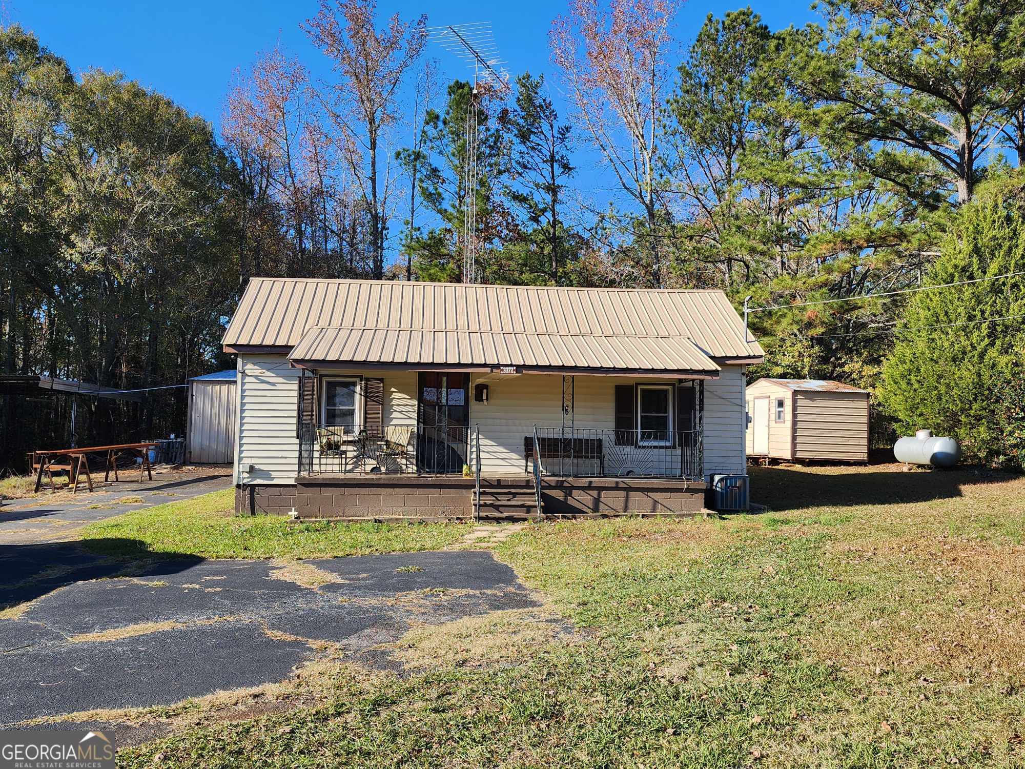 a front view of a house with patio