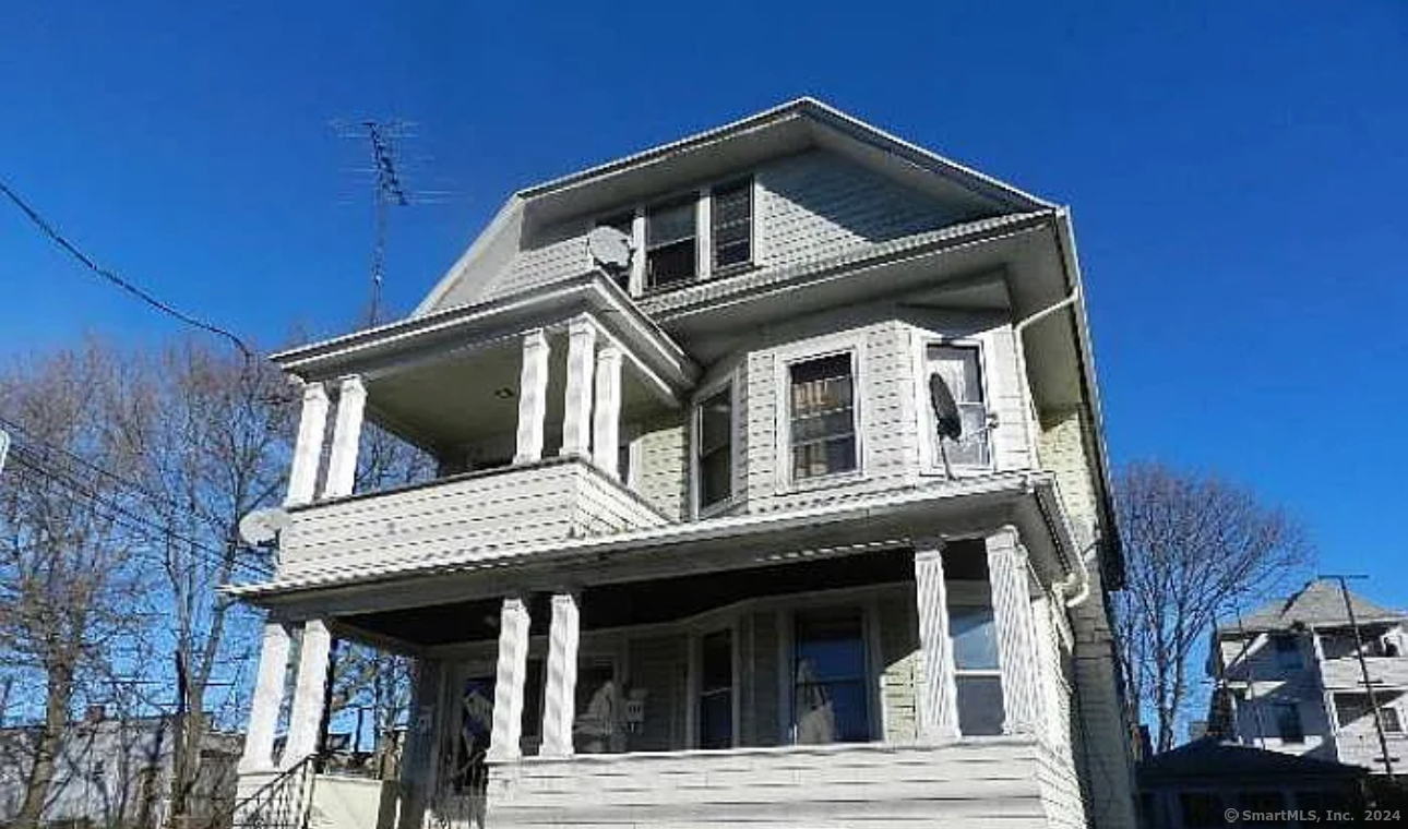 a front view of a house with balcony