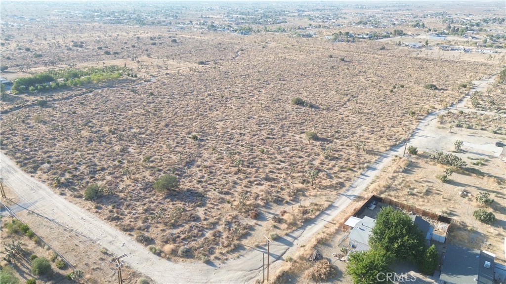 a view of beach and yard