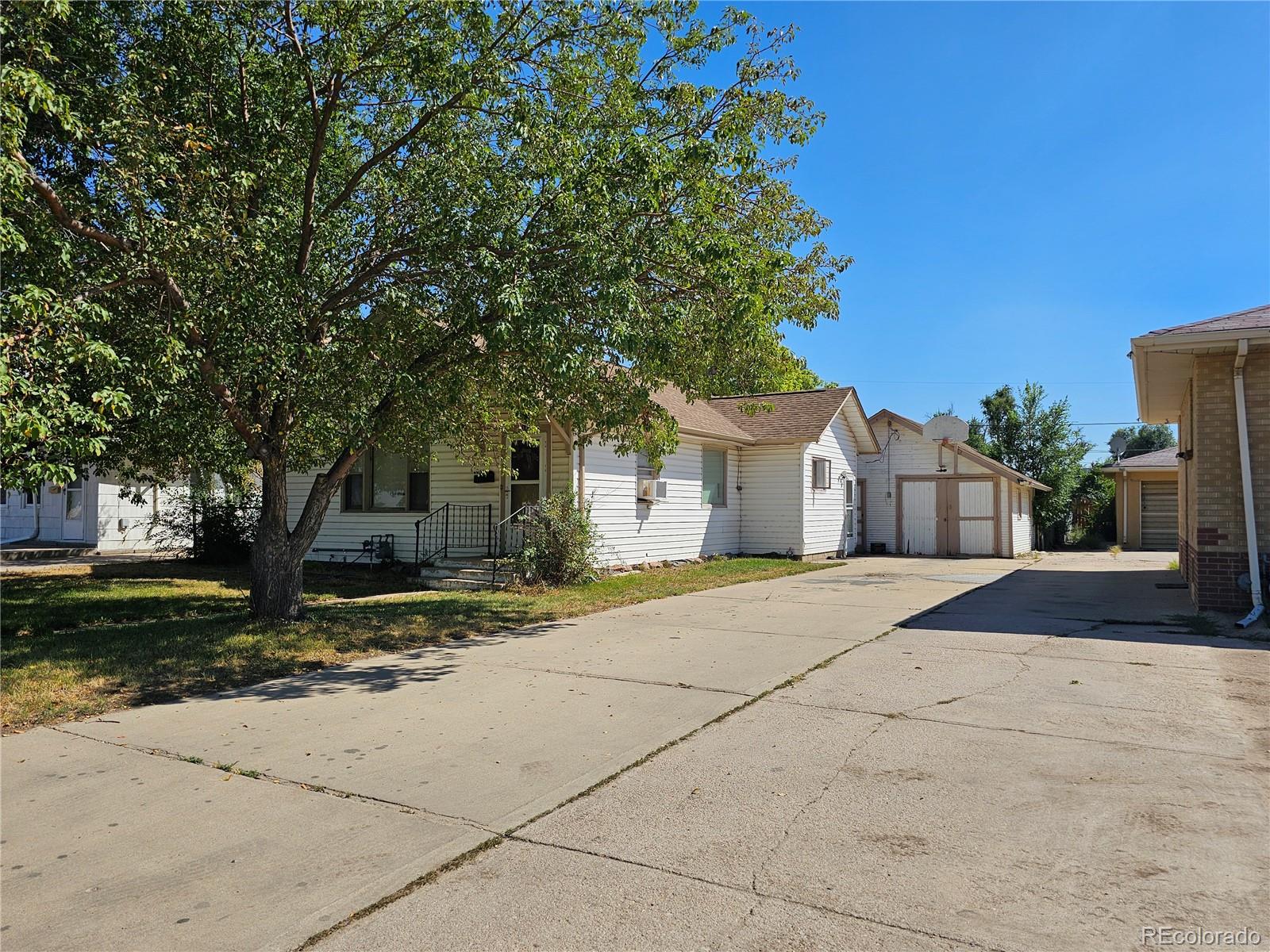 a house with trees in front of it