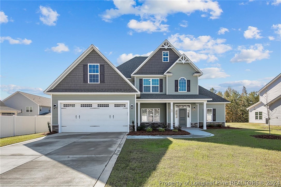 front view of a house with a yard