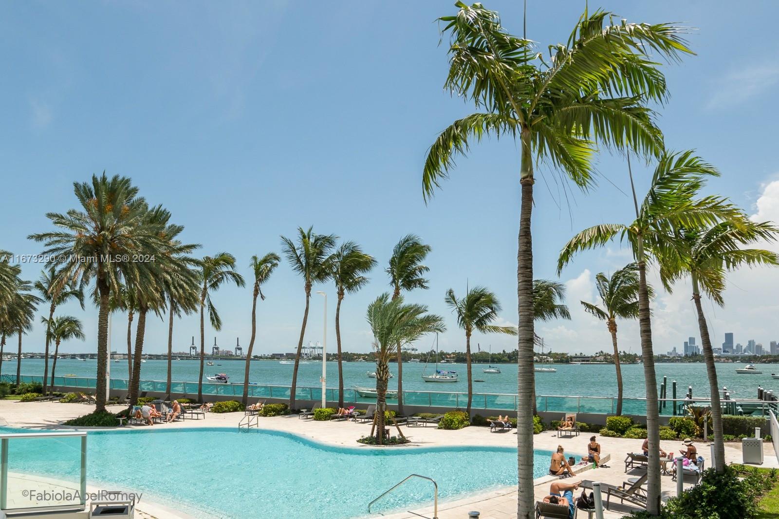 a view of outdoor space with palm trees