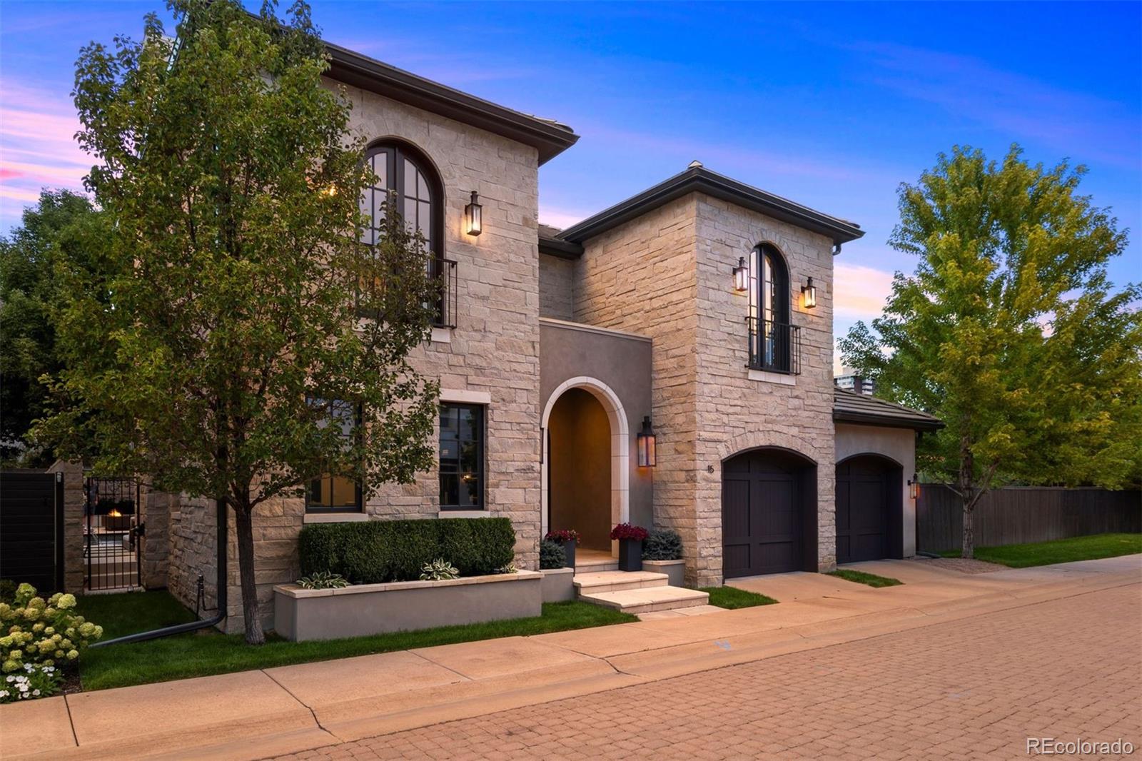 a front view of a house with yard