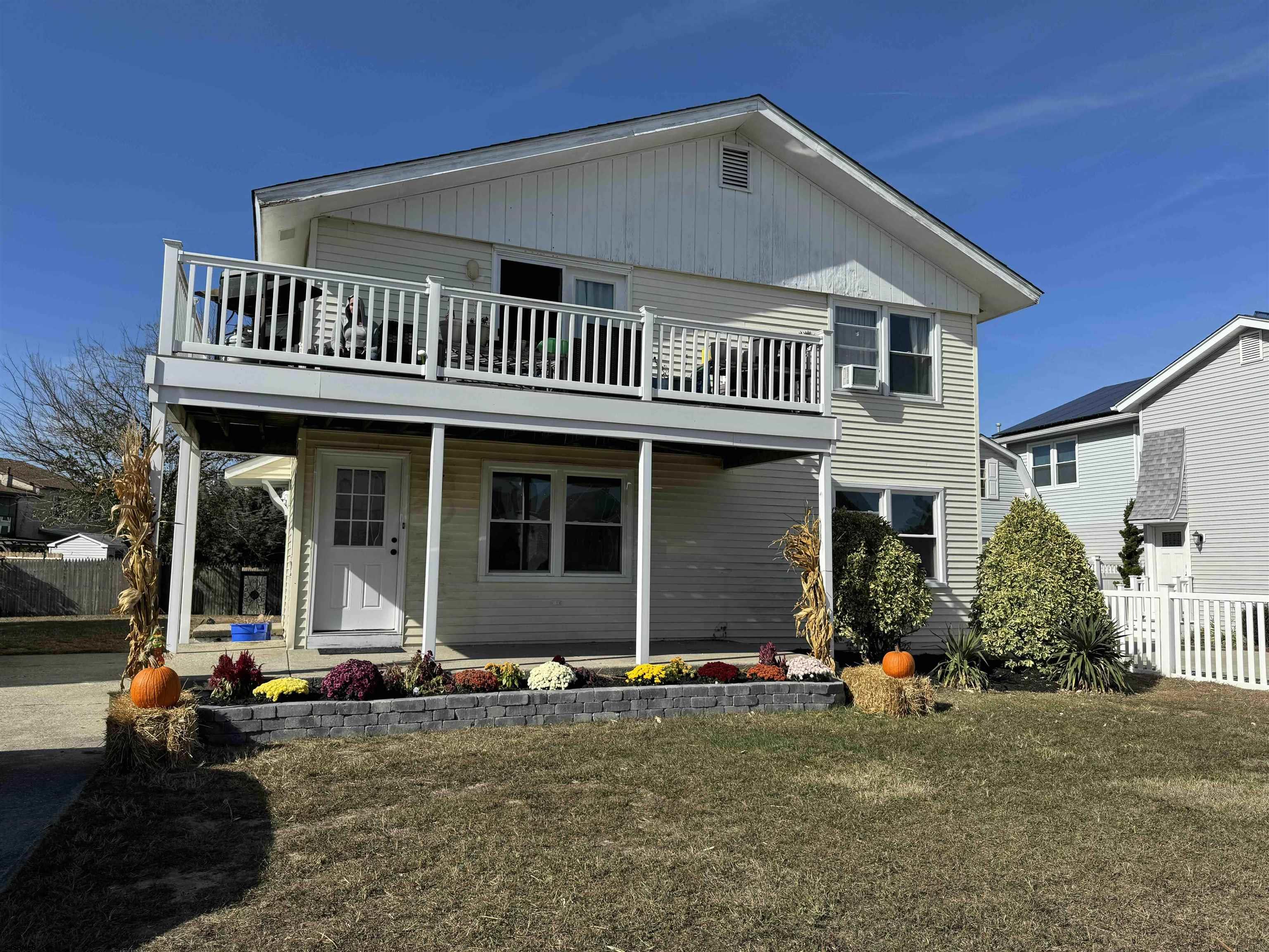 a front view of a house with garage