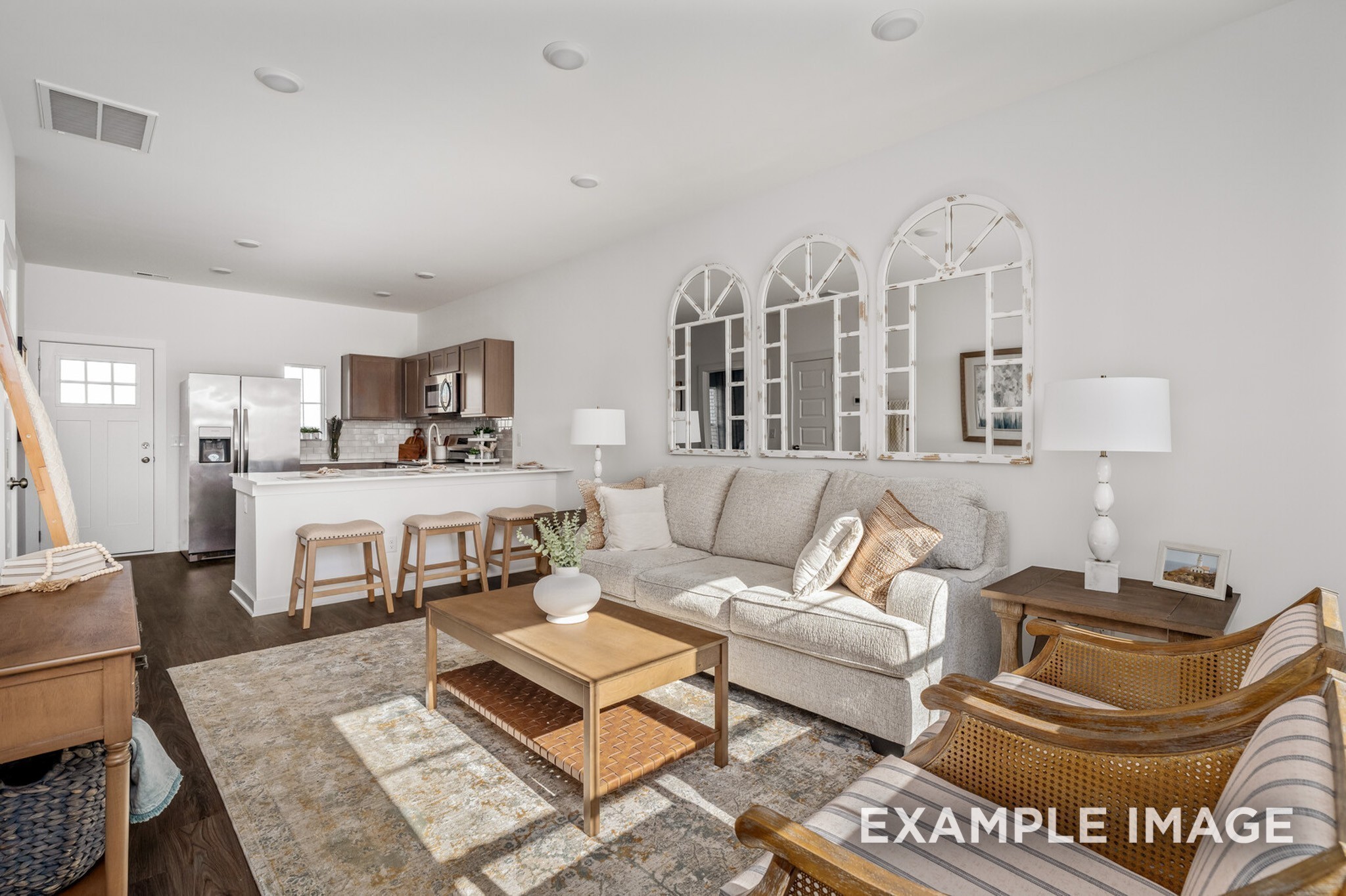 a living room with furniture and a table