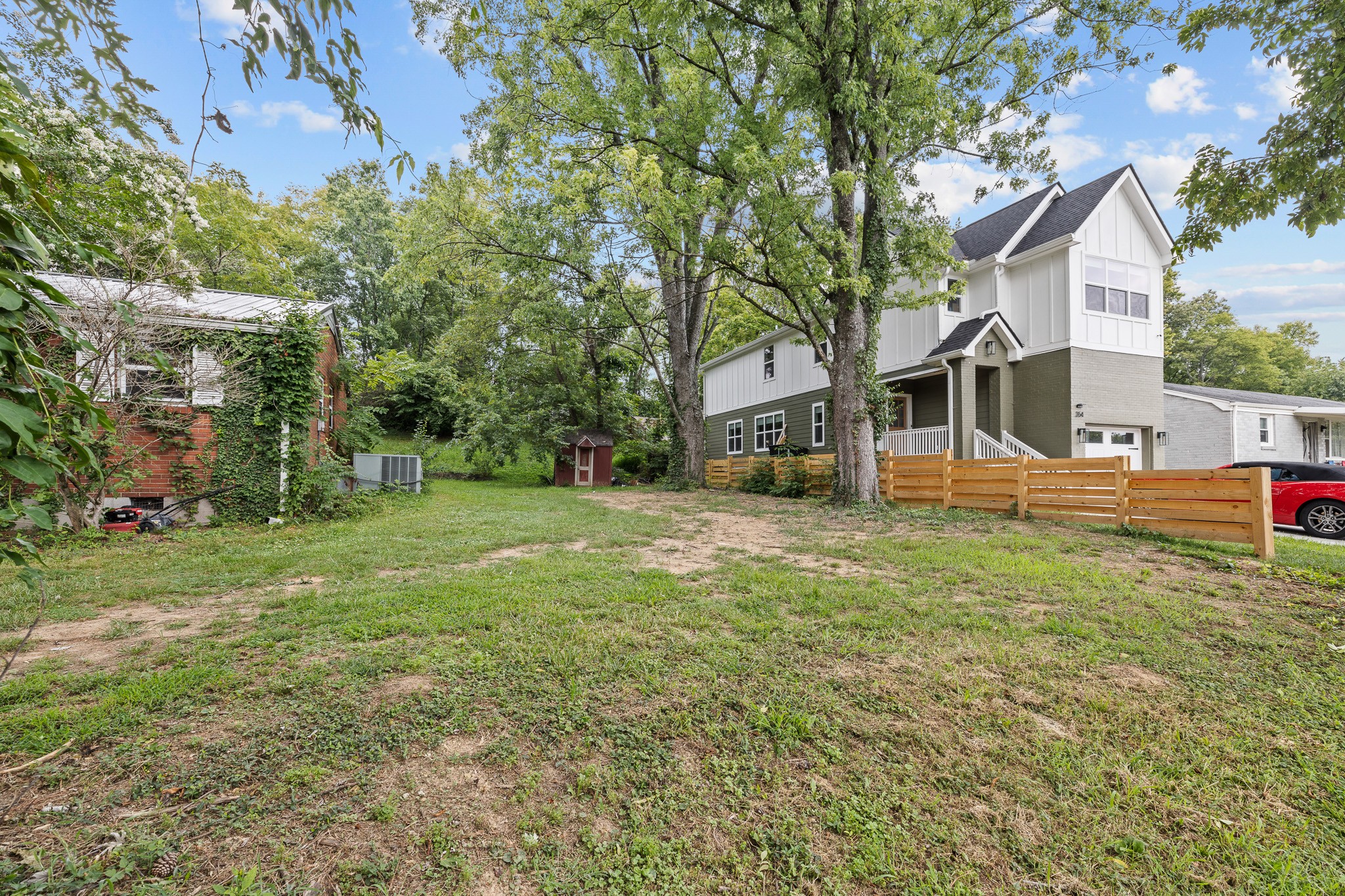 HPR Pad is located to the right of red brick existing home