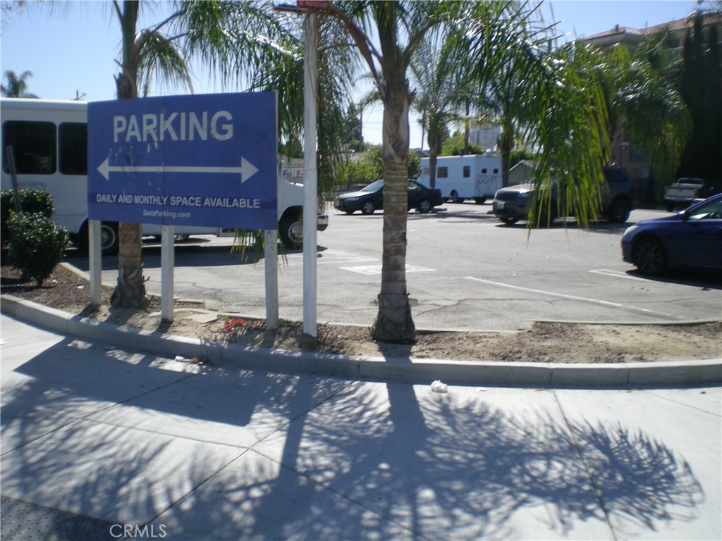 a sign board on the side of a building