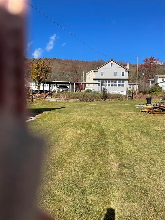 a view of a lake with a big yard