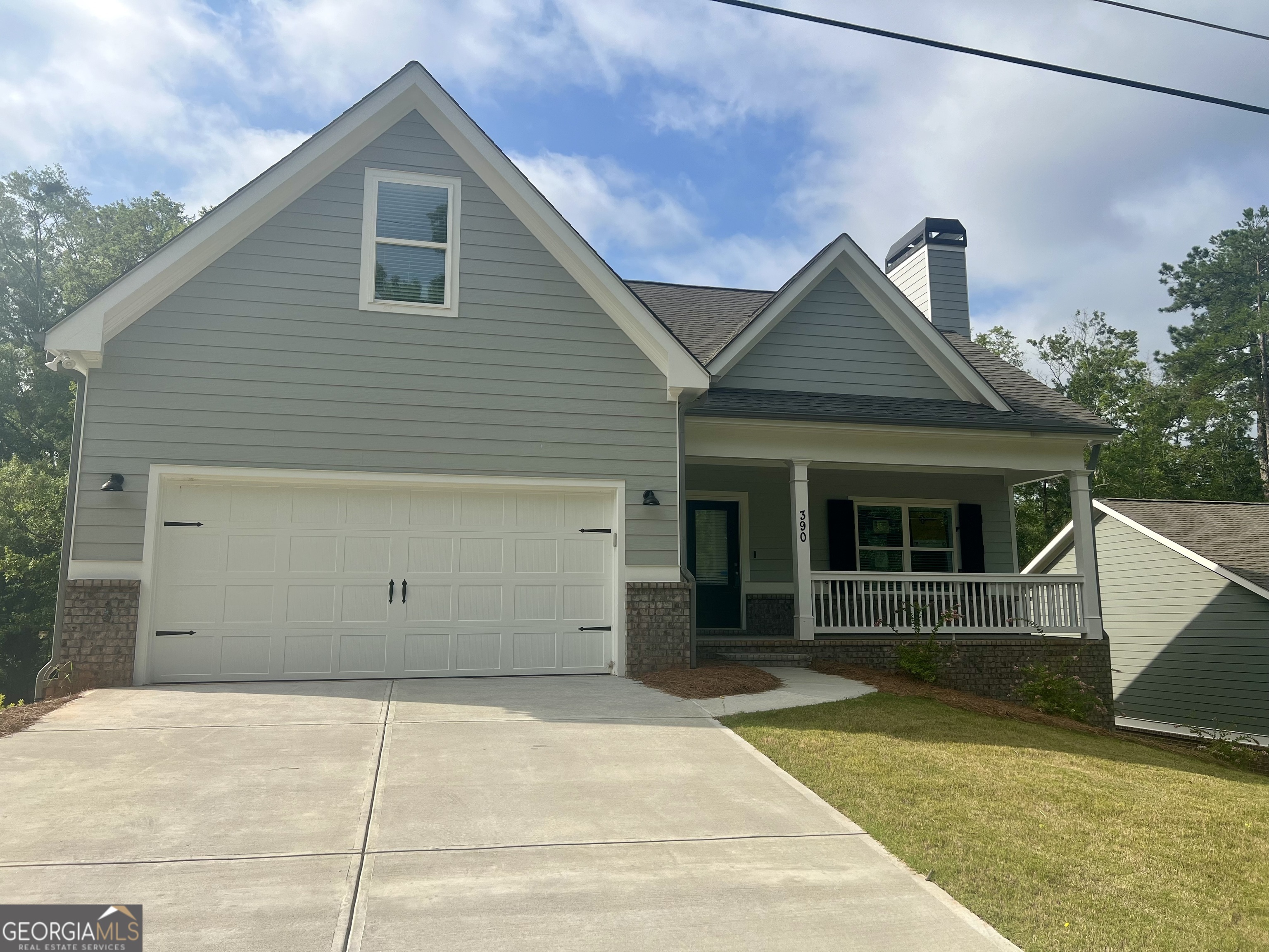 a view of a house with a garage