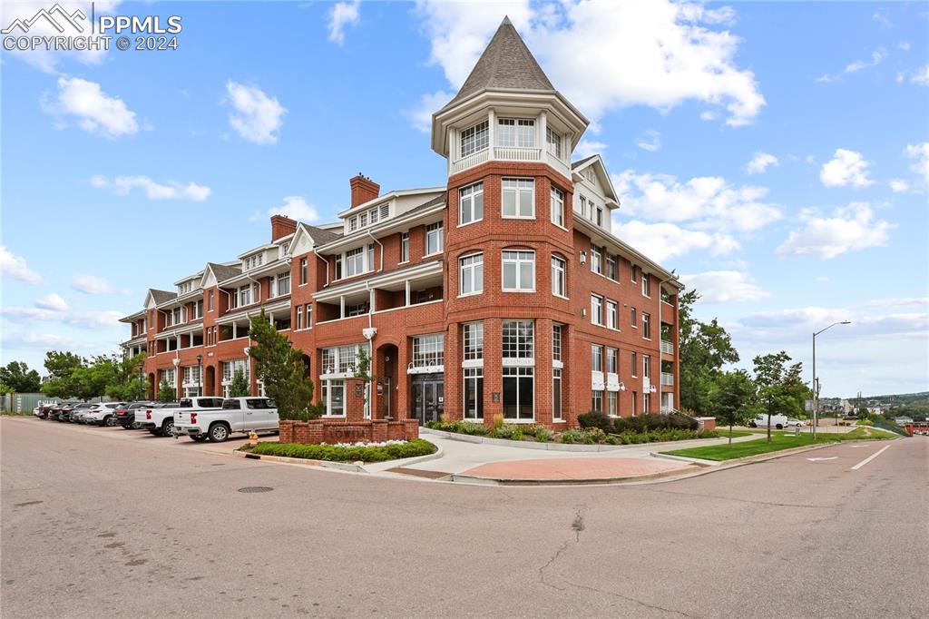 a front view of a building with street view